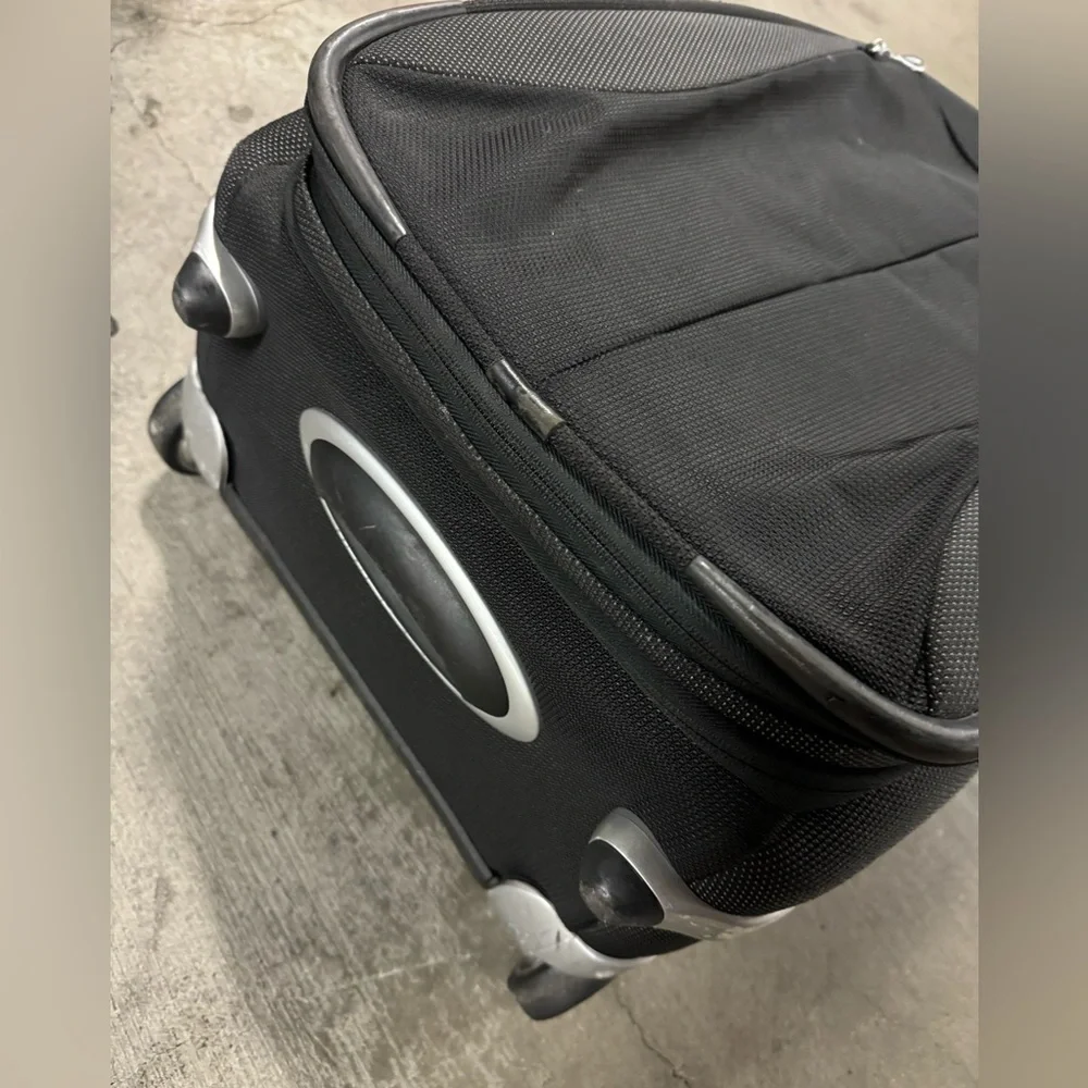 TUMI Carry On Rolling Suitcase